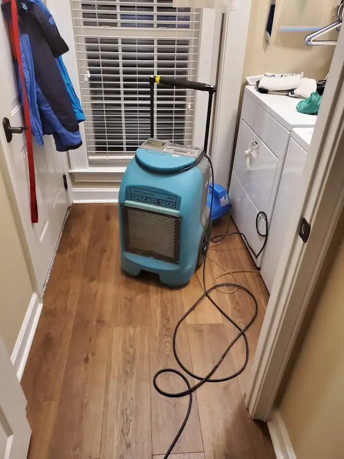 Commercial dehumidifier deployed for Flood Damage Cleanup in Whispering Pines